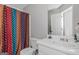 Bathroom with shower and vanity at 825 S Bethany Rd, Locust Grove, GA 30248