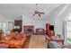 Spacious living room with hardwood floors, fireplace and ample natural light at 825 S Bethany Rd, Locust Grove, GA 30248