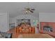 Spacious living room features a fireplace and a view into the kitchen at 825 S Bethany Rd, Locust Grove, GA 30248