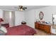 Bedroom with a queen-size bed and ornate dresser at 825 S Bethany Rd, Locust Grove, GA 30248