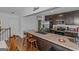 Updated kitchen, stainless steel appliances, and breakfast bar at 825 S Bethany Rd, Locust Grove, GA 30248