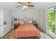 Main bedroom with ceiling fan and ample natural light at 825 S Bethany Rd, Locust Grove, GA 30248