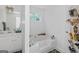 Bathroom with double vanity and soaking tub at 825 S Bethany Rd, Locust Grove, GA 30248