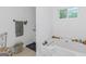 Bathroom with soaking tub and shower at 825 S Bethany Rd, Locust Grove, GA 30248