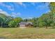 Brick ranch house with attached garage and large yard at 825 S Bethany Rd, Locust Grove, GA 30248