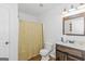 Small bathroom with shower and toilet at 825 S Bethany Rd, Locust Grove, GA 30248