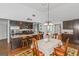 Kitchen with a dining area and hardwood floors at 825 S Bethany Rd, Locust Grove, GA 30248