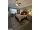 Spacious main bedroom with high ceilings and elegant furnishings at 133 Ventura Trl, Stockbridge, GA 30281