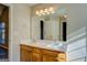 Double vanity bathroom with updated countertop and mirror at 156 Buddy Blvd, Mcdonough, GA 30252