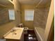 Bathroom with marble tile and updated vanity at 245 Argus Nw Cir, Atlanta, GA 30331