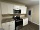 Updated kitchen with stainless steel appliances at 245 Argus Nw Cir, Atlanta, GA 30331