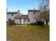 Private backyard with patio and grassy area at 602 Pine Tree Trl, College Park, GA 30349