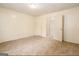 Spacious bedroom with carpeted floors and ample closet space at 602 Pine Tree Trl, College Park, GA 30349