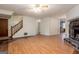 Living room with hardwood floors and fireplace at 602 Pine Tree Trl, College Park, GA 30349
