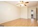 Bright bedroom featuring wood-look flooring and ceiling fan at 602 Pine Tree Trl, College Park, GA 30349
