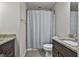 Clean bathroom with granite countertop and shower/tub combo at 84 Indiana Ave, Sharpsburg, GA 30277