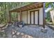 Backyard storage shed with bikes and stone pathway at 84 Indiana Ave, Sharpsburg, GA 30277