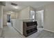 Upstairs hallway with carpet flooring and built-in storage at 84 Indiana Ave, Sharpsburg, GA 30277