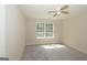 Well-lit bedroom with a window and ceiling fan at 1231 Hillview Rd, Hampton, GA 30228