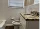 Clean bathroom with granite countertop and a bathtub at 2311 Amber Way, Decatur, GA 30032
