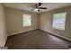 Bedroom with neutral decor and two windows at 2311 Amber Way, Decatur, GA 30032