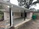 Covered carport with concrete slab and lighting at 2311 Amber Way, Decatur, GA 30032