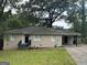Front view of ranch house with carport and lawn at 2311 Amber Way, Decatur, GA 30032