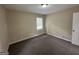 Bright bedroom featuring carpet and window blinds at 2311 Amber Way, Decatur, GA 30032