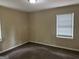 Spacious bedroom with neutral walls and carpet flooring at 2311 Amber Way, Decatur, GA 30032