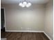Simple dining area with laminate flooring and neutral walls at 3188 Convair Ln, Decatur, GA 30032