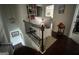Home office with a built-in desk and ample natural light at 844 Venture Sw Way, Atlanta, GA 30331