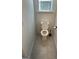 Simple powder room with toilet and storage at 844 Venture Sw Way, Atlanta, GA 30331