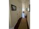 Bright hallway with hardwood floors and access to other rooms at 844 Venture Sw Way, Atlanta, GA 30331