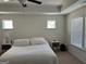 Bright main bedroom with a large bed and plenty of windows at 844 Venture Sw Way, Atlanta, GA 30331