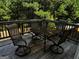 Wooden deck with patio furniture, offering a relaxing outdoor space at 844 Venture Sw Way, Atlanta, GA 30331