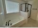 Modern bathroom with soaking tub and a separate shower at 844 Venture Sw Way, Atlanta, GA 30331
