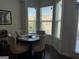 Breakfast nook with a round table and four chairs, overlooking a view at 844 Venture Sw Way, Atlanta, GA 30331
