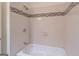Clean bathroom with tub and shower combination at 3142 Brooks Dr, Snellville, GA 30078