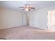 Spacious bedroom with ceiling fan and ample closet space at 3142 Brooks Dr, Snellville, GA 30078