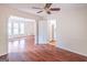 Bright dining room with hardwood floors and access to living room at 3142 Brooks Dr, Snellville, GA 30078