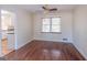 Simple dining room with hardwood floors and neutral walls at 3142 Brooks Dr, Snellville, GA 30078