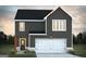 Two-story home with gray siding, white garage door, and orange accents at 177 Weldon Road # 51, Mcdonough, GA 30253