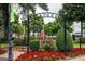 Scenic town square featuring an archway with town name, American flag, and well-maintained landscaping at 177 Weldon Road # 51, Mcdonough, GA 30253