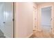 Bright hallway with neutral walls and carpet flooring at 177 Weldon Road # 51, Mcdonough, GA 30253