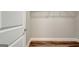 Spacious walk-in closet with built-in shelving and rod at 173 Mulberry Ct, Peachtree City, GA 30269