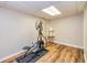 Basement gym with elliptical and wood flooring at 109 Rosewood Ct, Peachtree City, GA 30269