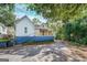 Side view of charming house with a porch and new paint at 2 Poplar St, Porterdale, GA 30070