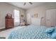 Spacious bedroom with a dresser and a comfortable armchair at 2 Poplar St, Porterdale, GA 30070
