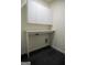 Laundry room with white cabinets and a spacious countertop at 3419 Hamilton Ave, Hapeville, GA 30354