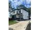 Modern two-story home with gray brick and white siding at 3419 Hamilton Ave, Hapeville, GA 30354